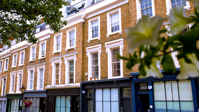 row of commercial properties and store fronts in UK