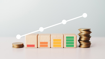 credit score improvement shown with wooden blocks and graph rising graphic